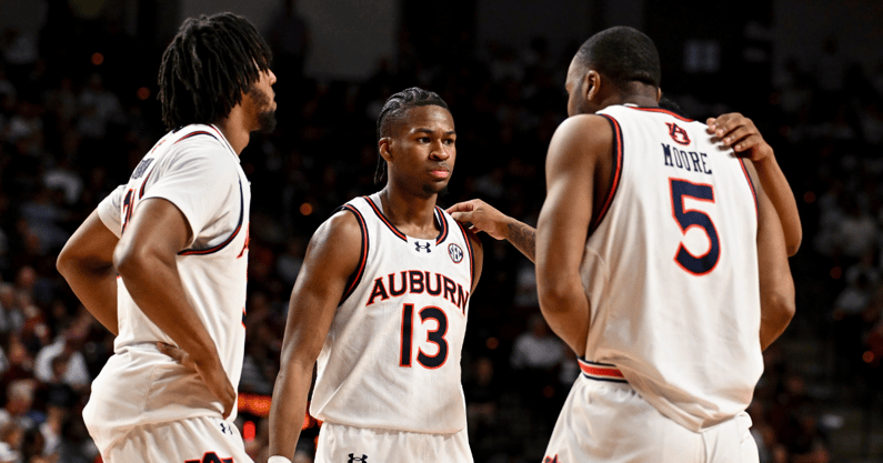 Chaney Johnson, Miles Kelly and Chris Moore. (Photo by USA Today)