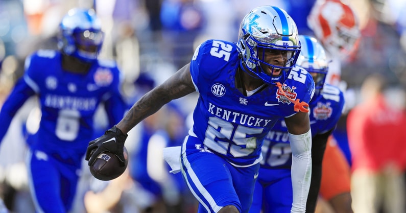 Kentucky Wildcats defensive back Jordan Lovett (25) reacts to an interception during the fourth quarter of an NCAA football matchup in the TaxSlayer Gator Bowl Friday, Dec. 29, 2023 at EverBank Stadium in Jacksonville, Fla. The Clemson Tigers edged the Kentucky Wildcats 38-35. [Corey Perrine/Florida Times-Union]