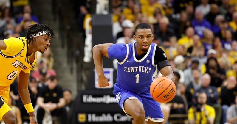 Mar 8, 2025; Columbia, Missouri, USA; Kentucky Wildcats guard Lamont Butler (1) dribbles past Missouri Tigers guard Anthony Robinson II (0) in the second half at Mizzou Arena. Mandatory Credit: Gary Rohman-Imagn Images