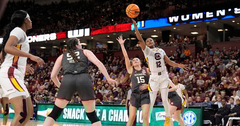 South Carolina Gamecocks guard MiLaysia Fulwiley (12) shoots past Oklahoma Sooners guard Lexy Keys (15) during the second half at Bon Secours Wellness Arena. Mandatory Credit: Jim Dedmon-Imagn Images