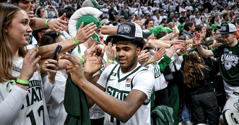 Michigan State's Jase Richardson celebrates with fans after beating Michigan on Sunday, March 9, 2025, at the Breslin Center in East Lansing - Nick King, USA TODAY Sports