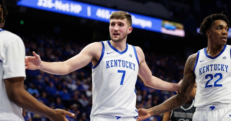 Dec 31, 2024; Lexington, Kentucky, USA; Kentucky Wildcats forward Andrew Carr (7) huddles up with teammates during the first half against the Brown Bears at Rupp Arena at Central Bank Center. Mandatory Credit: Jordan Prather-Imagn Images