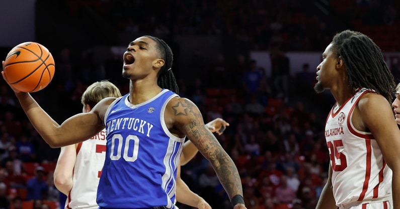 Feb 26, 2025; Norman, Oklahoma, USA; Kentucky Wildcats guard Otega Oweh (00) reacts after a play against the Oklahoma Sooners during the first half at Lloyd Noble Center. Mandatory Credit: Alonzo Adams-Imagn Images