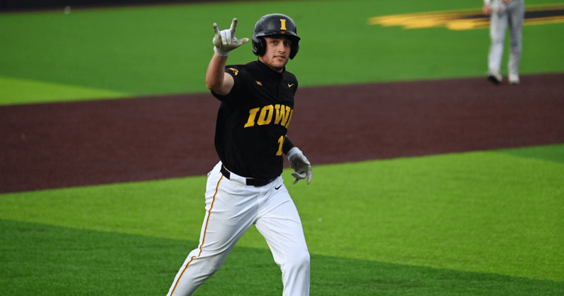 Iowa infielder Jaixen Frost reacts to his three-run home run against Michigan State. (Photo by Dennis Scheidt)