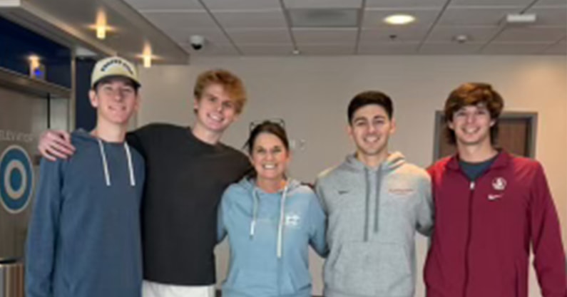 Left to Right- Ty Schmitt, Charlie Frantz, Mary Watkins (Wife of Todd0, Tommy Provenzano, and Brandon Moore at the hopsital (Photo Courtsey of Mary Watkins)