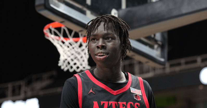 Dec 21, 2024; San Jose, California, USA; San Diego State Aztecs forward Magoon Gwath (0) during the second half against the California Golden Bears at SAP Center. Mandatory Credit: Darren Yamashita-Imagn Images
