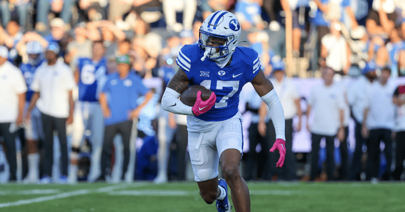 Oct 21, 2023; Provo, Utah, USA; Brigham Young Cougars wide receiver Keelan Marion (17) returns a kick against the Texas Tech Red Raiders in the first half at LaVell Edwards Stadium. Mandatory Credit: Rob Gray-Imagn Images