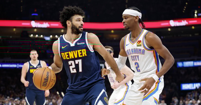 Mar 10, 2025; Oklahoma City, Oklahoma, USA;Denver Nuggets guard Jamal Murray (27) drives against Oklahoma City Thunder guard Shai Gilgeous-Alexander (2) during the second quarter at Paycom Center. Mandatory Credit: Alonzo Adams-Imagn Images