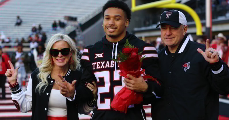 Nov 30, 2024; Lubbock, Texas, USA; Texas Tech Red Raiders defensive back Devynn Cromwell (22) is honored on senior day before the game against the West Virginia Mountaineers at Jones AT&T Stadium and Cody Campbell Field. (Photo Credit: Michael C. Johnson-Imagn Images)