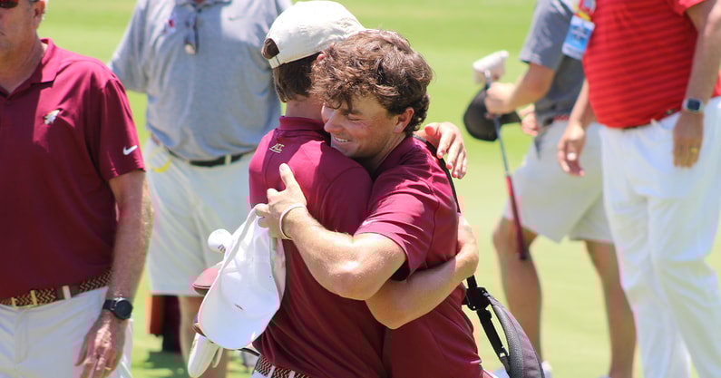 Luke Clanton embraces his teamates after win (Matt LaSerre:Warchant)