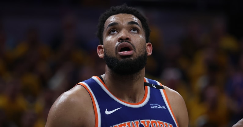 May 27, 2025; Indianapolis, Indiana, USA; New York Knicks center Karl-Anthony Towns (32) looks up at a scoreboard during the third quarter against the Indiana Pacers of game four of the eastern conference finals for the 2025 NBA Playoffs at Gainbridge Fieldhouse. Mandatory Credit: Trevor Ruszkowski-Imagn Images