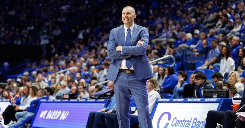 Feb 8, 2025; Lexington, Kentucky, USA; Kentucky Wildcats head coach Mark Pope smiles as he watches the action during the second half against the South Carolina Gamecocks at Rupp Arena at Central Bank Center. Mandatory Credit: Jordan Prather-Imagn Images