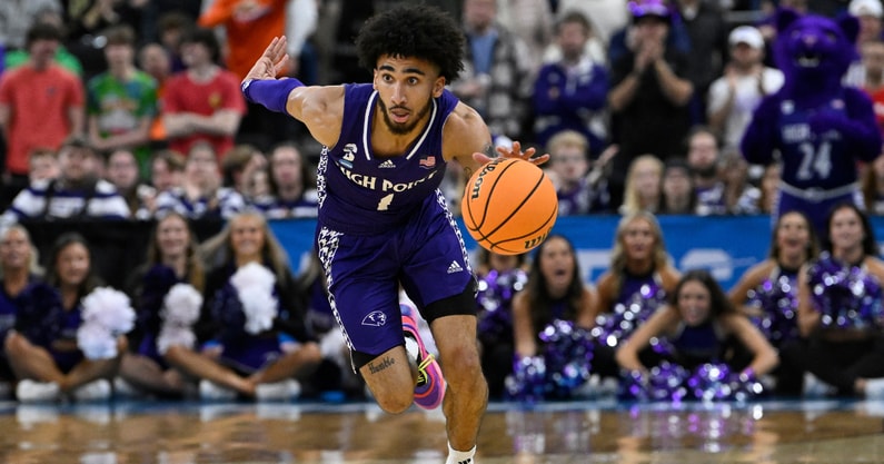 High Point Panthers guard Kezza Giffa (1) brings the ball upcourt against the Purdue Boilermakers during the first half at Amica Mutual Pavilion