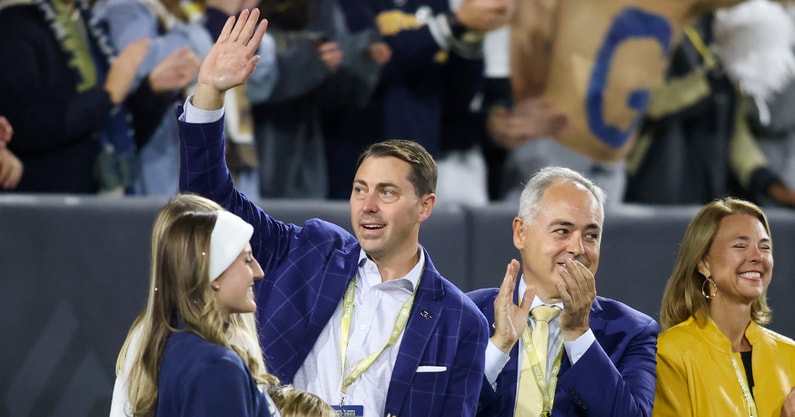 Georgia Tech Yellow Jackets athletic director J Batt is introduced on the field as president Angel Cabrera against the Virginia Cavaliers in the first half at Bobby Dodd Stadium. - Brett Davis, USA TODAY Sports