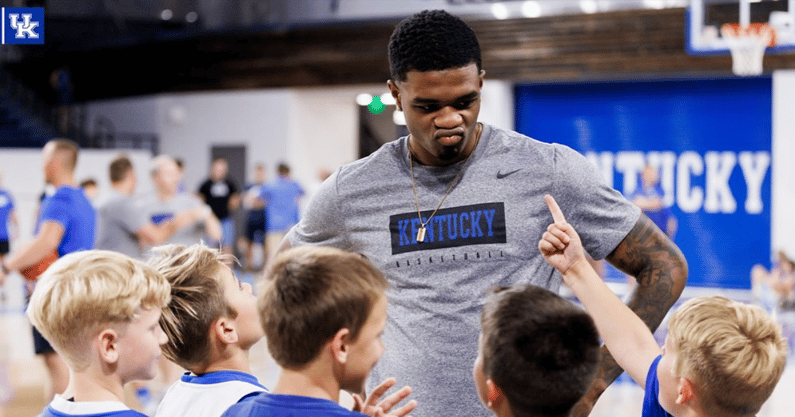 What is this camper saying to Kentucky SG Otega Oweh? (UK Athletics)