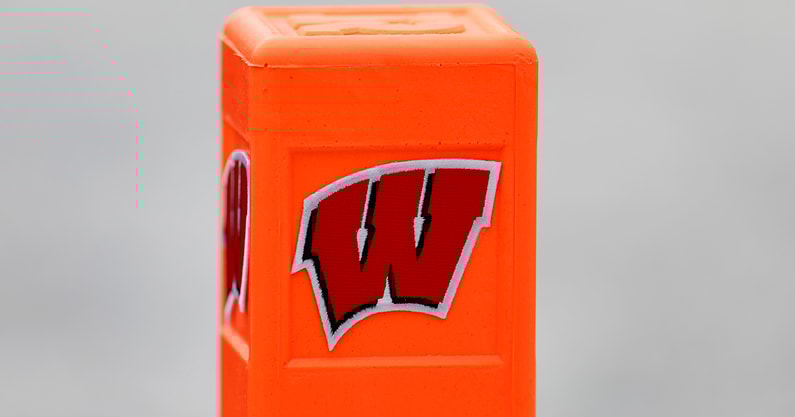 Wisconsin Badgers logo on a pylon