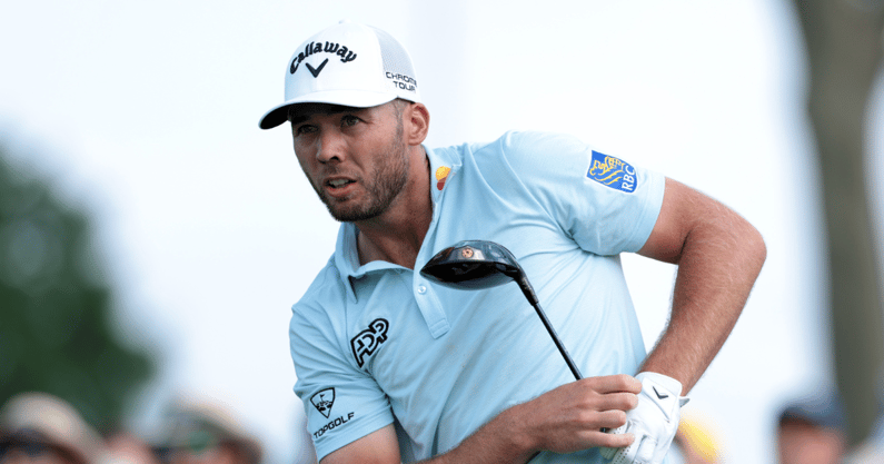 Jun 14, 2025; Oakmont, Pennsylvania, USA; Sam Burns plays his shot from the 15th tee during the third round of the U.S. Open golf tournament. Mandatory Credit: Bill Streicher-Imagn Images