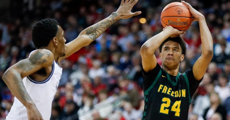Freedom High School's Donovan Davis (24) shoots the ball against Milwaukee Academy of Science during the WIAA Division 3 state championship game on Saturday, March 22, 2025, at the Kohl Center in Madison, Wis. Milwaukee Academy of Science won the game, 57-54. Tork Mason/USA TODAY NETWORK-Wisconsin