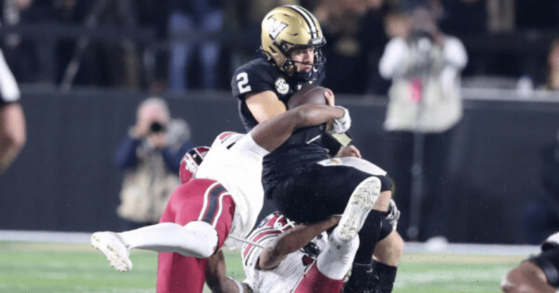 South Carolina's defense bringing down Vanderbilt Commodores quarterback Diego Pavia during last year's 28-7 blowout win in Nashville. Photo by: CJ Driggers | GamecockCentral