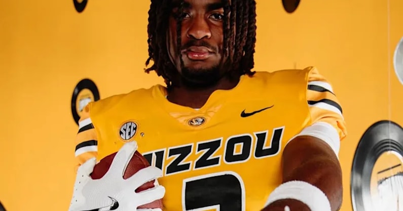 Jayden Petit poses during his Missouri official visit at Memorial