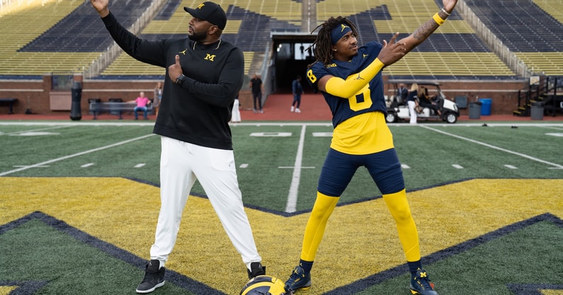 Dorian Barney with Sherrone Moore