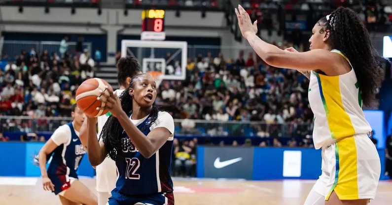 Joyce Edwards looks to score against Kamilla Cardoso in the 2025 FIBA Women's AmeriCup final. Courtesy: FIBA