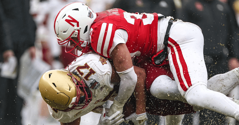 Boston College Eagles tight end Jeremiah Franklin (17) is tackled by Nebraska Cornhuskers linebacker Javin Wright (33) during the first half at Yankee Stadium.