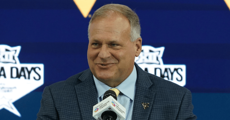 Rich-Rodriguez-explains-why-he-continues-coaching-lot-easier-than-working-in-the-coal-mines-or-digging-ditch