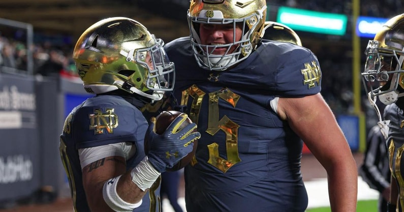 Notre Dame offensive lineman Sullivan Absher and running back Aneyas Williams