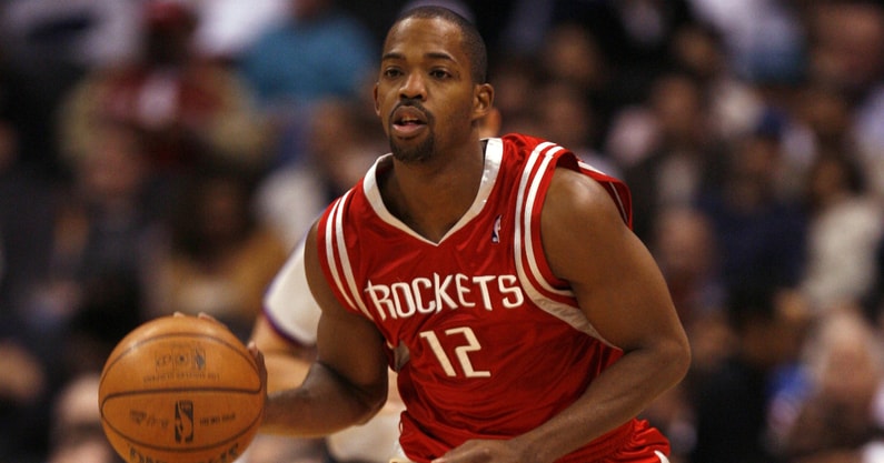 Houston point guard Rafer Alston brings the ball up court during the game against the Clippers