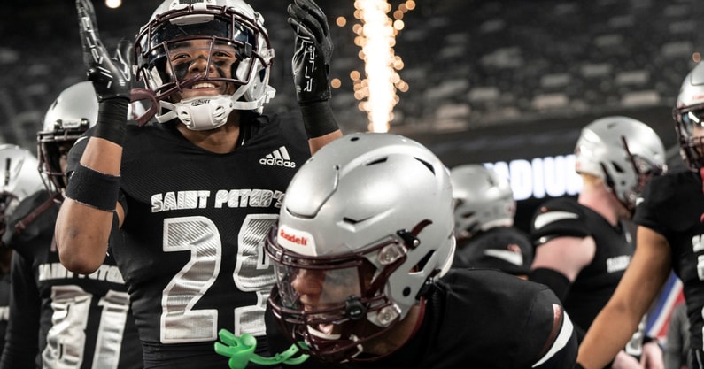 St. Peter's Prep players get ready for a New Jersey high school football game against Don Bosco Prep.