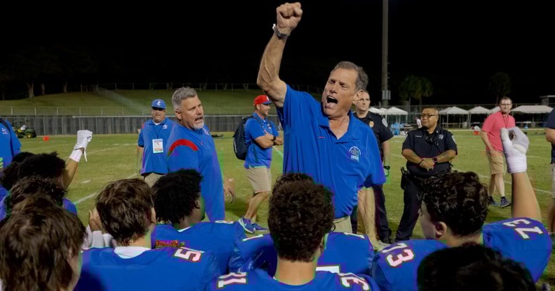John Curtis Patriots head coach John T. Curtis, Jr. celebrates with his players.
