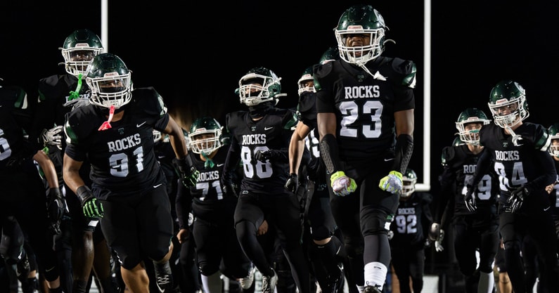 The Trinity Shamrocks took to the field before a Kentucky high school football game.
