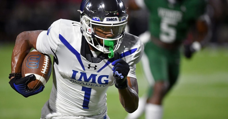 IMG Academy receiver Donovan Olugbode looks to gain extra yardage.