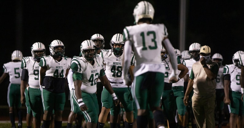 Miami Central enters the field before a Florida high school football game