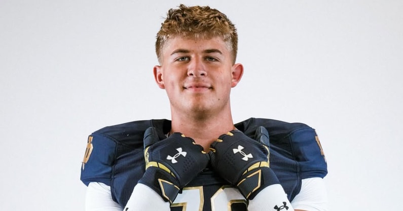 Grayson McKeogh poses on his Notre Dame official visit.