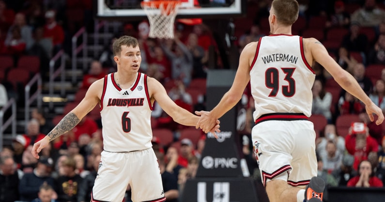 Louisville Cardinals guard Reyne Smith (6) celebrates Noah Waterman's (93) three pointer during their game against the UTEP Miners on Wednesday, Dec. 11, 2024 at the KFC Yum! Center in Louisville, Ky.