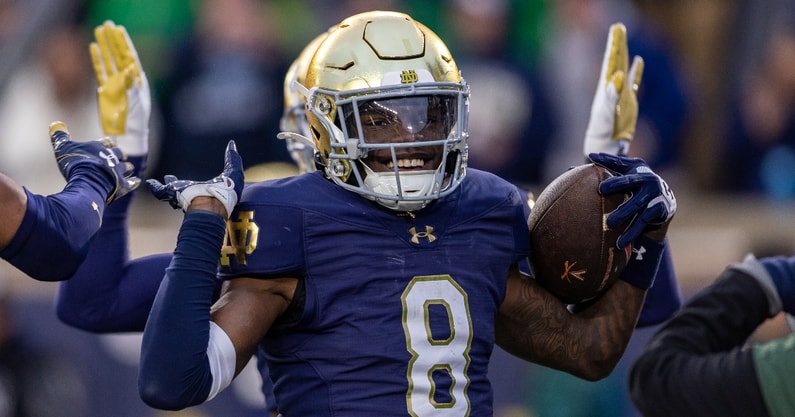 Adon Shuler celebrates interception against Virginia in 2024.