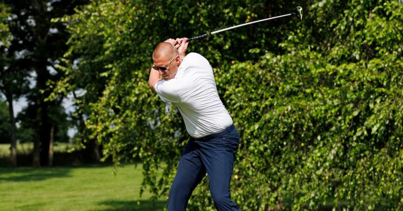 Mark Pope swinging a golf club - Tommy Quarles, UK Athletics