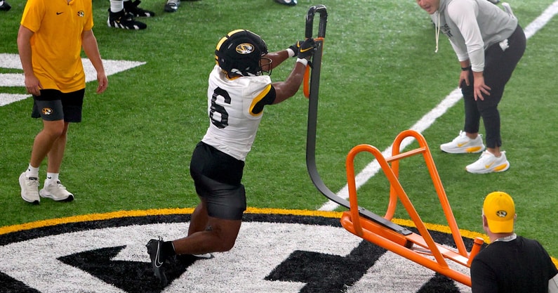 Jalen Catalon sheds a blocking dummy