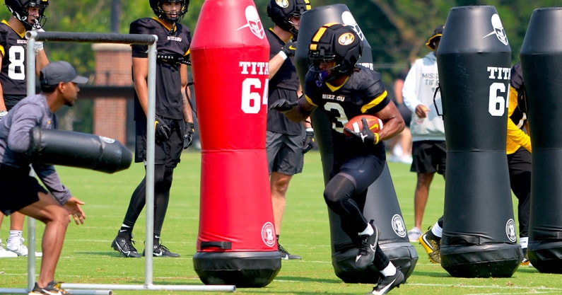 Kevin Coleman goes through a drill