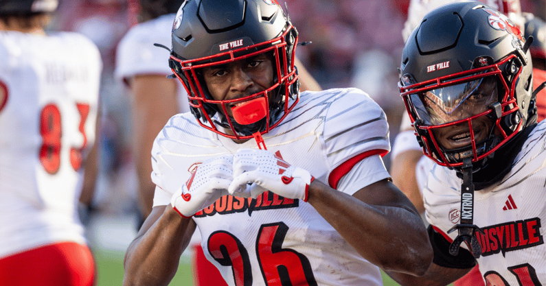 Nov 16, 2024; Stanford, California, USA; Louisville Cardinals running back Duke Watson (26) celebrates his touchdown during the third quarter against the Stanford Cardinal at Stanford Stadium. Mandatory Credit: Bob Kupbens-Imagn Images