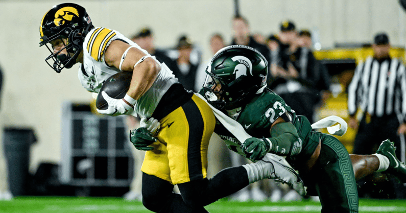 Michigan State's Darius Snow, right, tackles Iowa's Kaden Wetjen in the first quarter on Saturday, Oct. 19, 2024, at Spartan Stadium in East Lansing. - Nick King, USA TODAY Sports