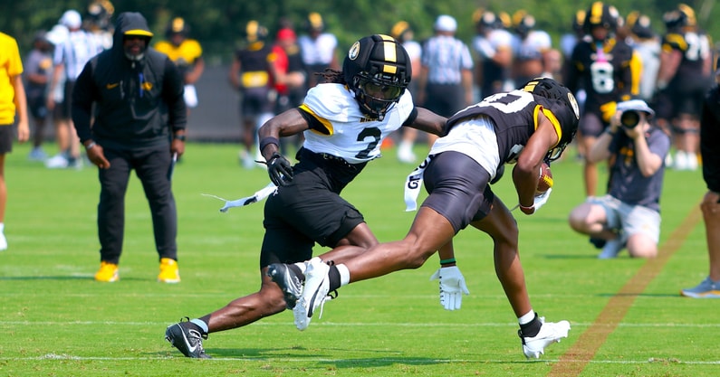 Toriano Pride makes a tackle during a drill