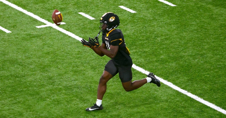 DaMarion Fowlkes runs up to catch a punt