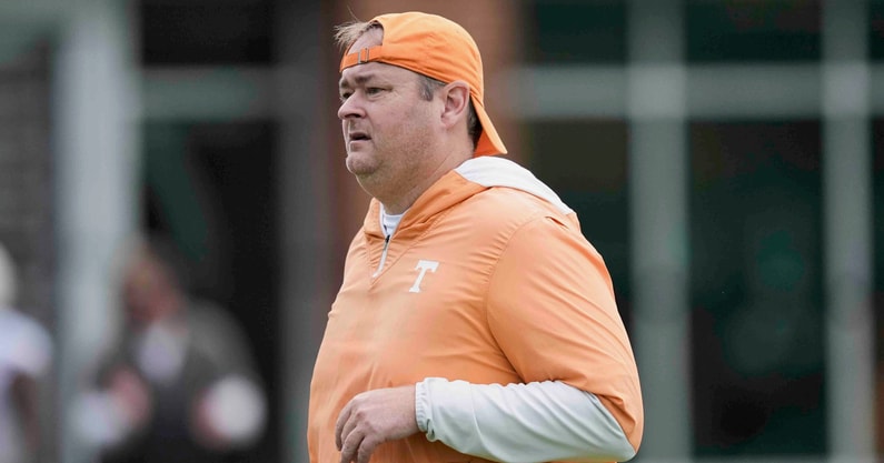 Caitie McMekin/News Sentinel / USA TODAY NETWORK via Imagn Images | Tennessee head coach Josh Heupel jogs across the field during Tennessee football preseason practice, in Knoxville, Tennessee, July 31, 2025.