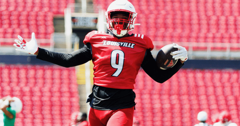 Louisville football's Antonio Watts (9) celebrates with the football during Louisville's first scrimmage on 8/9/2025