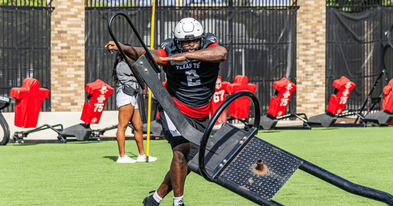 Texas Tech defensive tackle Lee Hunter drives a sled during preseason practice after being named to the 2025 Bednarik Award watch list