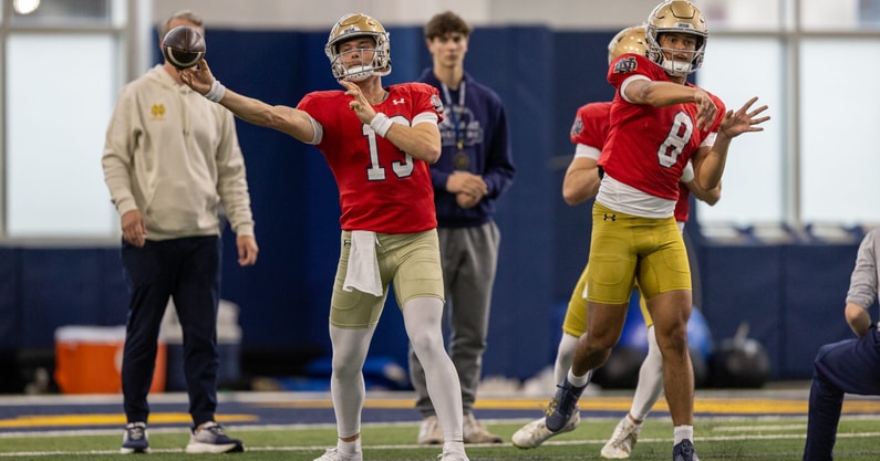 Notre Dame QBs coach Gino Guidugli with quarterbacks CJ Carr (13) and Kenny Minchey (8)