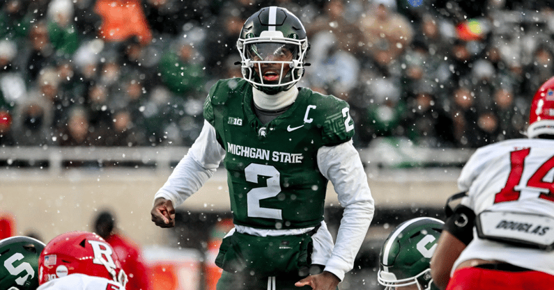 Michigan State's Aidan Chiles prepares to snap the ball against Rutgers during the second quarter on Saturday, Nov. 30, 2024, at Spartan Stadium in East Lansing. - Nick King, USA TODAY Sports